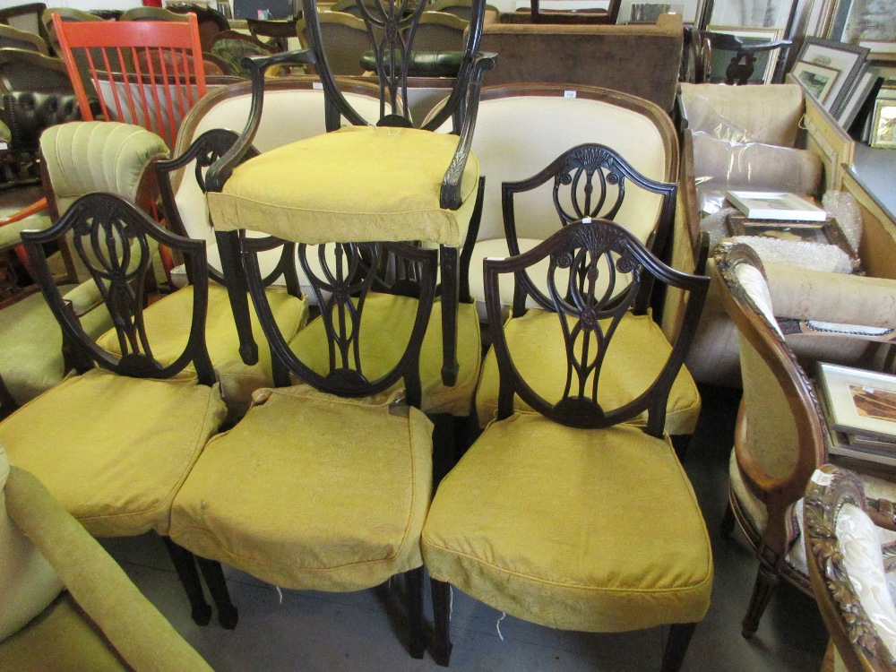 Set of seven (six plus one) early20th Century mahogany shield back dining chairs in Hepplewhite