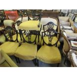 Set of seven (six plus one) early20th Century mahogany shield back dining chairs in Hepplewhite