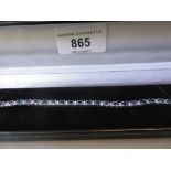 18ct White gold sapphire and diamond line bracelet, the sapphires of approximately 12.31ct total and