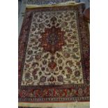 Mid to late 20th Century silk style rug with a lobed medallion and all-over stylised floral design