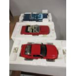 Group of three Franklin Mint model cars, 1967 Ford Mustang convertible, 1957 Chevrolet Bel Air and a