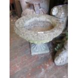 Reconstituted circular stone pedestal garden urn