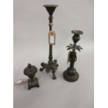 Regency brown patinated bronze figural candlestick, together with another Regency bronze candlestick