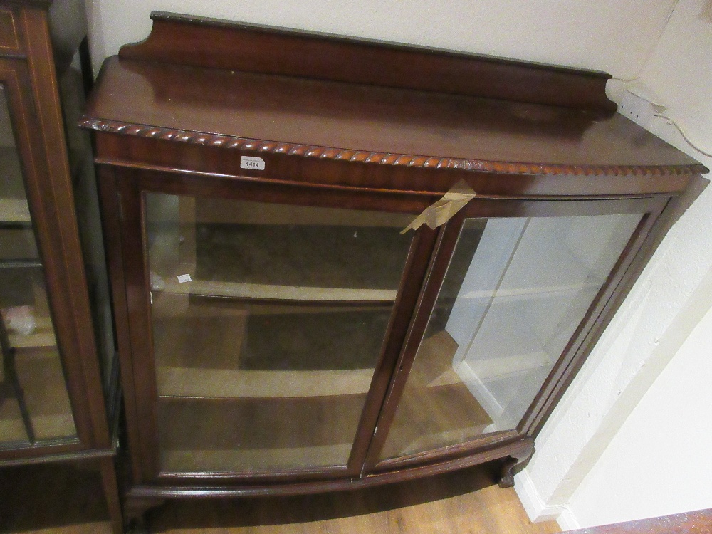 1920's Mahogany two door bow fronted display cabinet on claw and ball feet