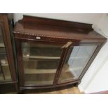 1920's Mahogany two door bow fronted display cabinet on claw and ball feet