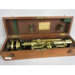 Troughton and Simms, London, brass surveyor's level in original mahogany case