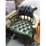 20th Century green buttoned leather upholstered revolving office chair