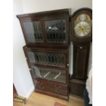 Mahogany Globe Wernicke type four section bookcase with leaded glass doors above four drawers