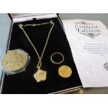 1914 half Sovereign, a Greenwich Millennium coin, a gold wedding band and a gold and rose gold