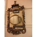 19th Century carved pine and gilded wall mirror in Chippendale style having pagoda top and carved