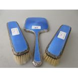 Silver and blue translucent enamel three piece dressing table set comprising: mirror and two brushes