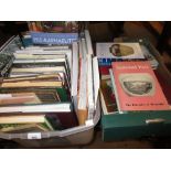 Four boxes containing a collection of various new and old books on world porcelain and pottery