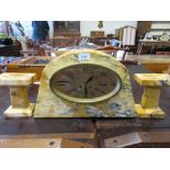 Art Deco Carerra marble three piece clock garniture, the oval gilt dial with Arabic numerals, signed