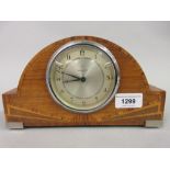 Art Deco walnut and inlaid dome shaped mantel clock together with a 19th Century ebonised mantel