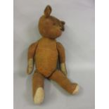 Early 20th Century straw filled articulated teddy bear, 27ins high