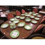 19th Century English forty one piece dessert service decorated with pink roses on an apple green