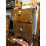 20th Century walnut cased Broadcaster ' Plus-a-Gram ', the hinged fall front enclosing record player