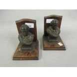 Pair of oak bookends mounted with a spelter patinated bust of Shakespeare