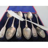 Cased set of six 19th Century silver fiddle and shell pattern teaspoons, together with a sterling
