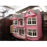 Large 20th Century double bay dolls house together with a large quantity of dolls house furniture