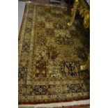 Indo Persian carpet of all-over floral panel design, 9ft 6ins x 7ft 8ins