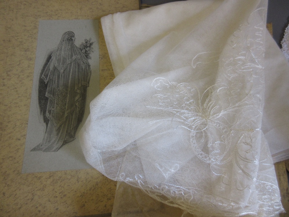 Mid 20th Century bridal veil in original box, together with a quantity of various crochet work