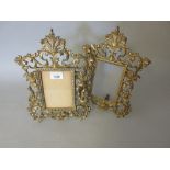 Pair of ornate cast brass photograph frames of pierced floral design