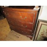 Reproduction mahogany three drawer bow front chest with brass handles and bracket feet