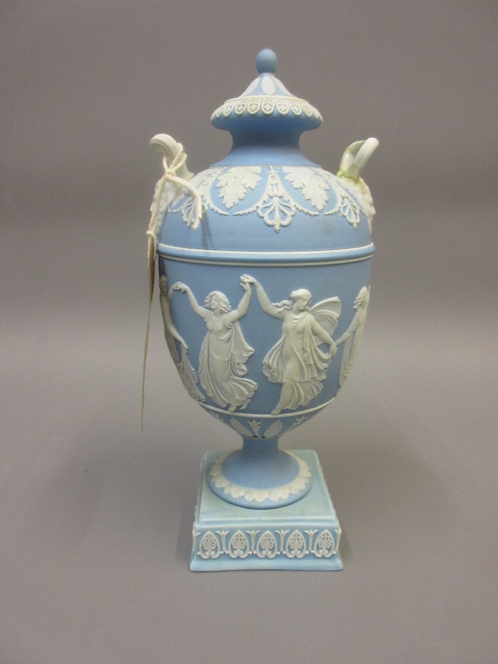 19th Century Wedgwood blue Jasperware two handled pedestal vase and cover relief decorated with a