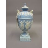19th Century Wedgwood blue Jasperware two handled pedestal vase and cover relief decorated with a