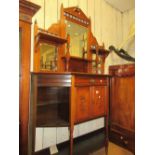 Late Victorian walnut chiffonier in Aesthetic style with a mirrored shelf back above a drawer,