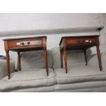 Pair of reproduction mahogany lamp tables each with a single drawer on turned supports