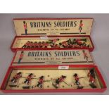 Two Britains boxed sets of lead soldiers, ' The Black Watch ', No. 11 and ' The Coldstream