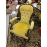 Victorian carved walnut gold velvet button upholstered balloon back open elbow chair raised on