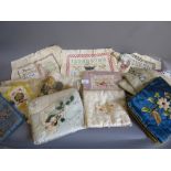Two World War I sweetheart needle cases, three unframed samplers and other similar textiles
