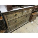 Late 19th Century ash straight front chest of two short and two long drawers with brass handles