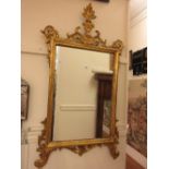 Good quality reproduction carved and gilded wall mirror in 18th Century style, 50ins high