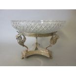 Silver plated table centre with winged gryhon supports on tri-form base with paw feet and cut