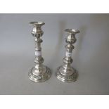 Pair of Sheffield silver plate on copper telescopic circular candlesticks with sconces