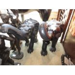 Pair of large ebony figures of elephants