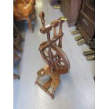 Early 20th Century beech and fruitwood spinning wheel on turned supports