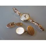Pair of 9ct gold cufflinks together with a ladies 9ct gold wristwatch with a 9ct gold expanding