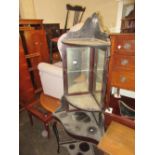 19th Century mahogany corner display cabinet having carved decoration, bar glazed bow fronted door