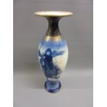 Large Royal Doulton Blue Children baluster form vase decorated with a figure in a winter
