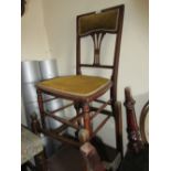 Edwardian line inlaid mahogany nursing chair on turned supports and an early 20th Century folding
