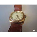Gentleman's 18ct gold cased cushion shaped wristwatch by Tavannes, the enamel dial with Arabic