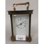 Modern brass cased carriage clock by Matthew Norman, London with original fitted case