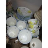 Foley China Daffodil pattern tea service with various saucers, side plates etc