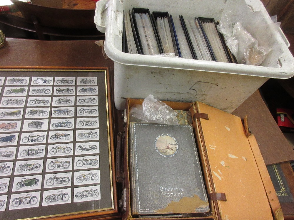 Collection of cigarette cards housed in six albums, together with a case containing miscellaneous