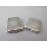 Two silver engine turned match book holders